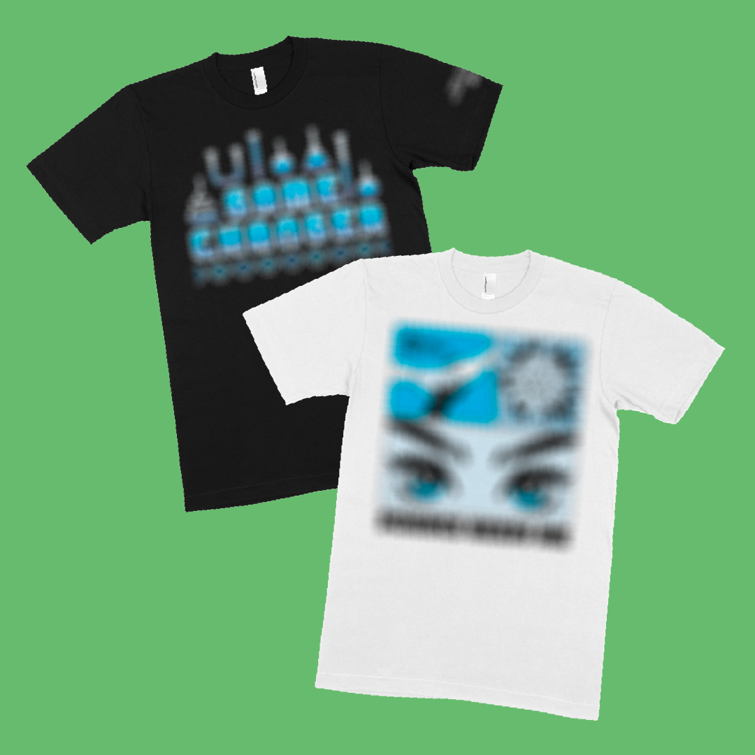 Two t-shirts, one black and one white, with blurred designed overlaying each other on a green background.